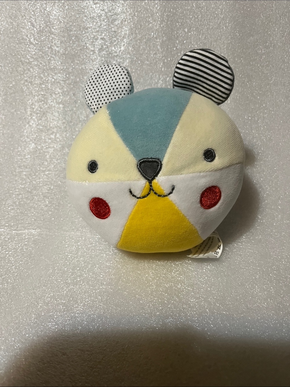 Petit Collage Plush Round Bear Rattle - Yellow, Teal, Cream.